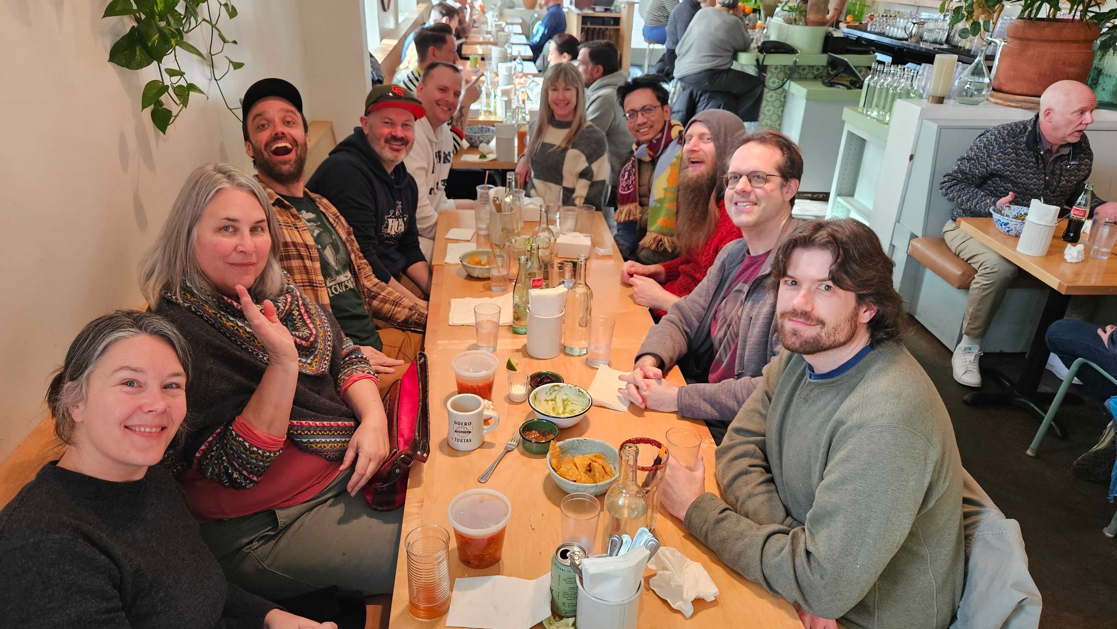 The Olio Apps team enjoying a meal together